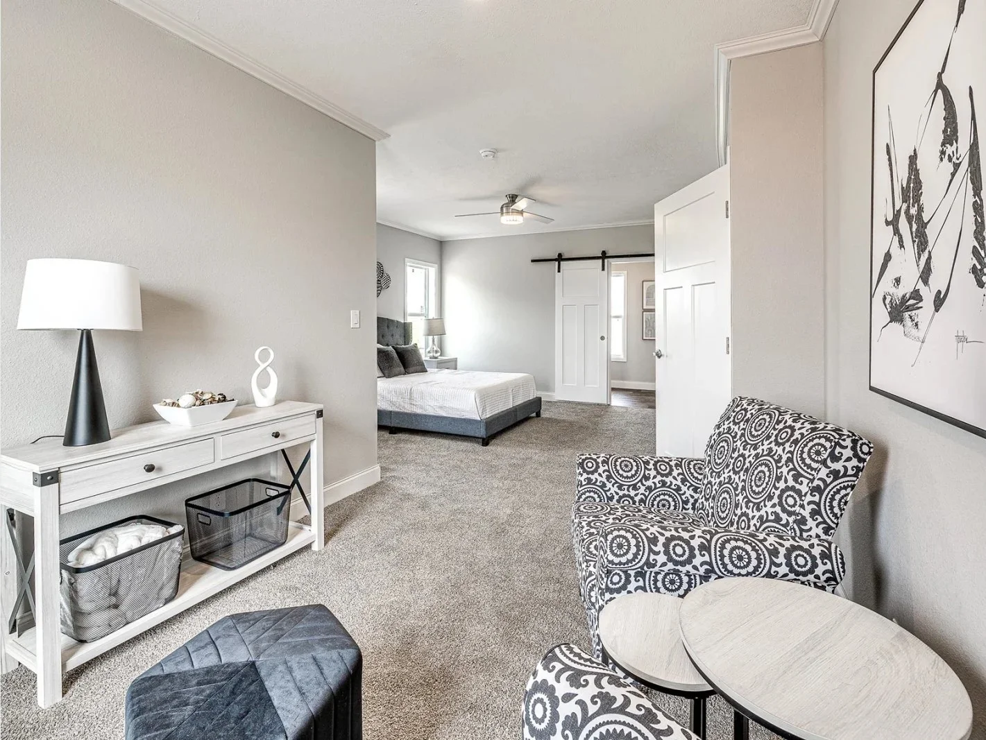 a room with a bed and a chair
