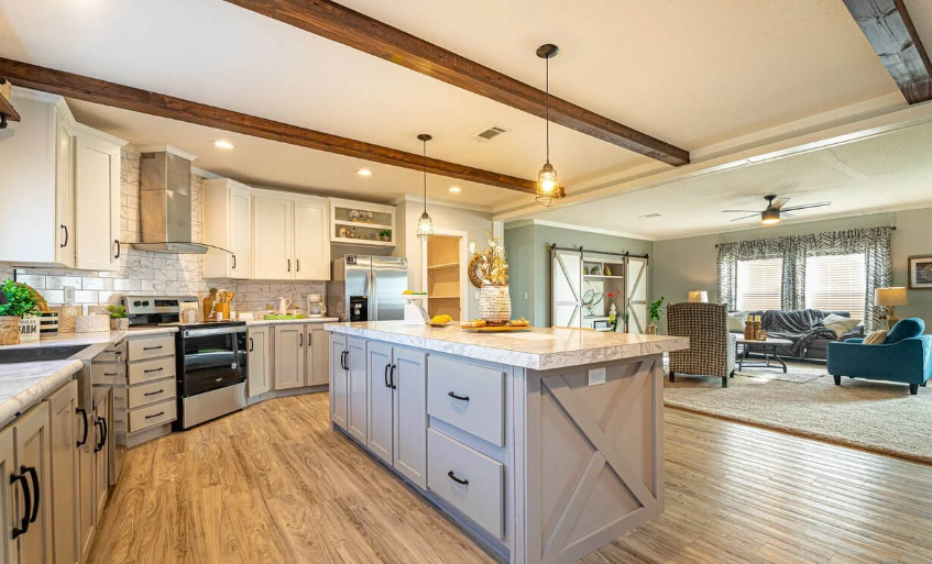 Modern kitchen and open-concept living area in a stylishly upgraded mobile home
