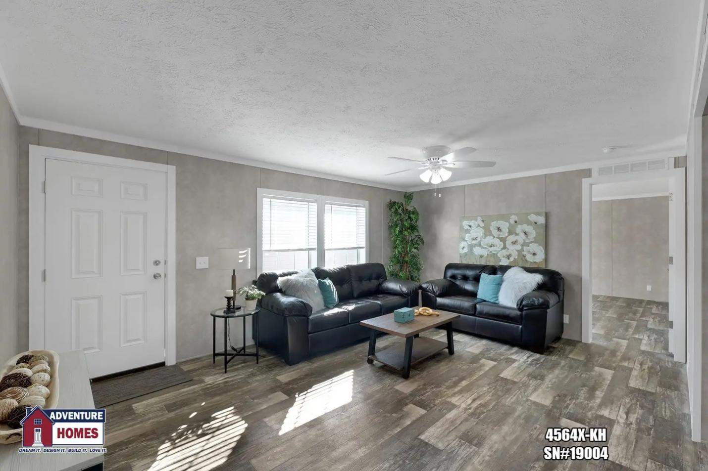 A cozy living room with wooden floor