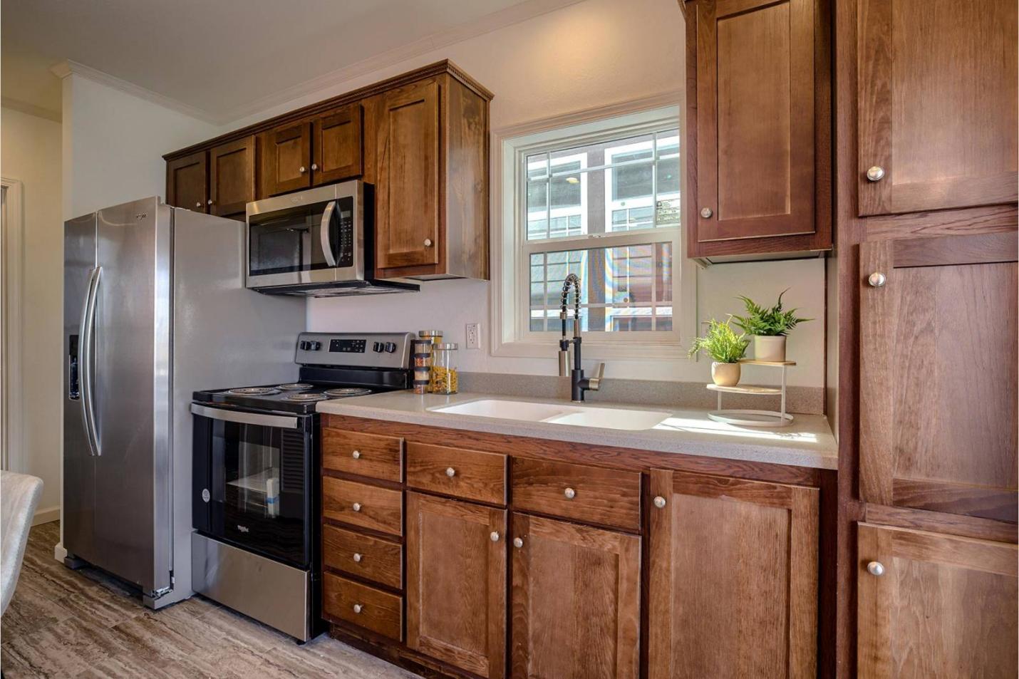 Wooden cabinets in the cottage kitchen