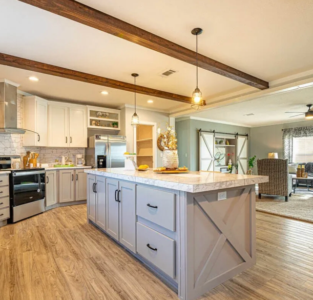 Modern kitchen and lounge in a triple-wide mobile home